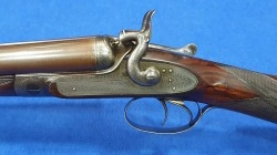 Escopeta paralela J. Purdey "Bar-In-Wood"